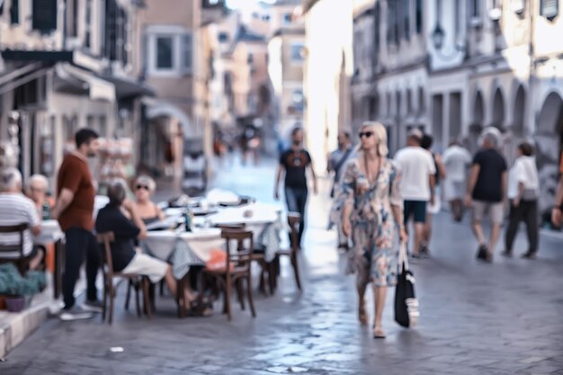 abstract pedestrian street background in europe, tourism concept blurred background