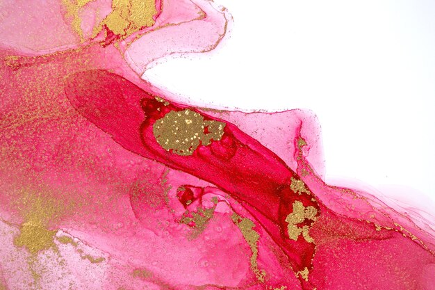 추상 분홍색 아크릴 잉크 그라데이션 방울과 흰색 배경에 고립 된 골드 레이어