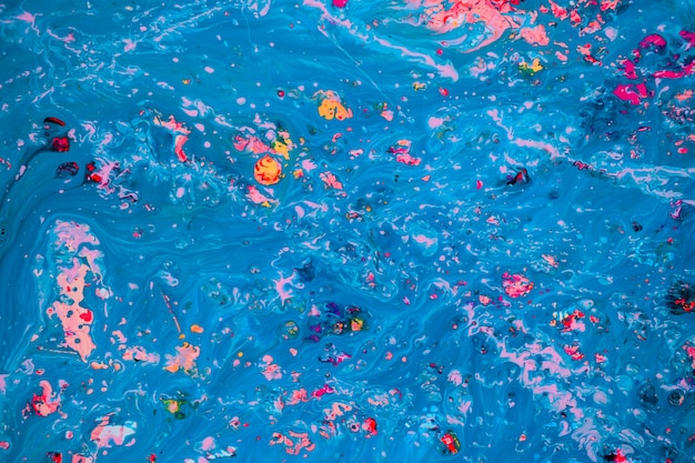 Фото Абстрактная розовая и голубая картина на холсте с использованием жидкой акриловой техники. мраморная текстура