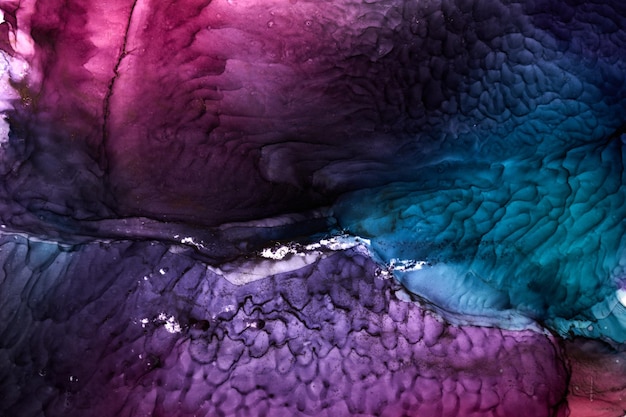 抽象的なピンクブルーの水彩画の背景。水に染みや波状の斑点をペイント、豪華な液体液体アートの壁紙