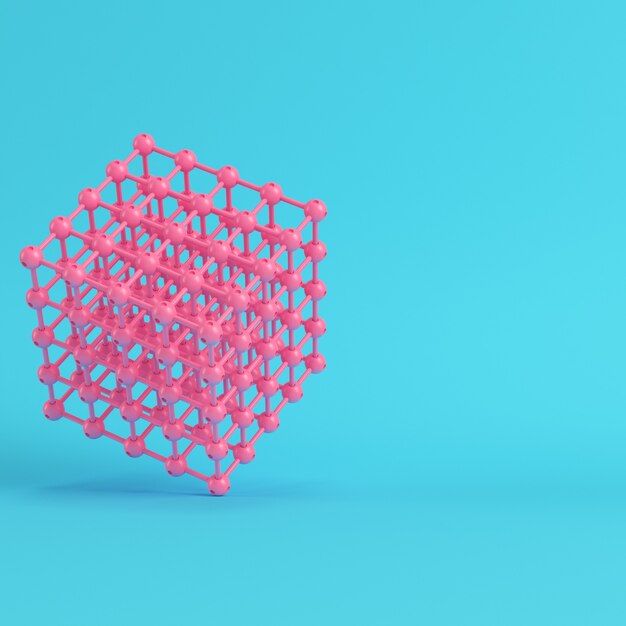 Abstract pink spheres in wire box on bright blue background