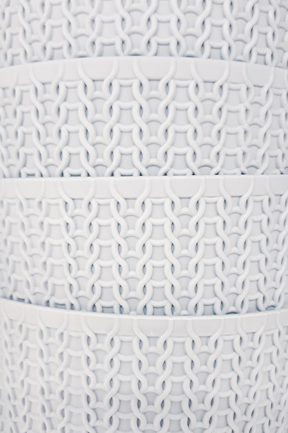 Struttura in plastica astratta da vicino modello su tessuto superficie della maglia