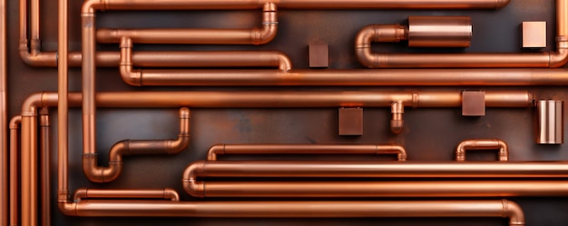 Abstract plumbing copper pipes texture artistic with empty copy space