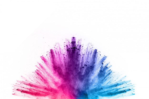 Photo abstract powder splatted background. colorful powder explosion on white background.