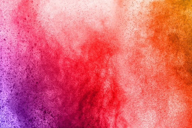 abstract powder splatted background. Colorful powder explosion on white background. 