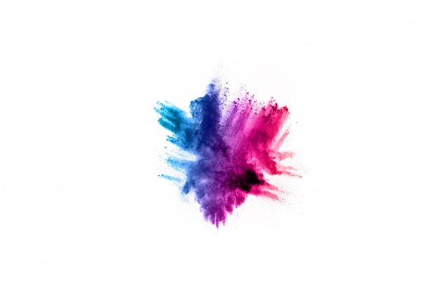 Photo abstract powder splatted background. colorful powder explosion on white background.