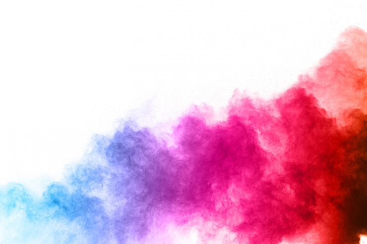 Photo abstract powder splatted background. colorful powder explosion on white background. 