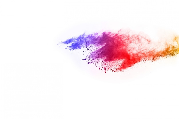 Abstract powder splatted background. Colorful powder explosion on white background.  