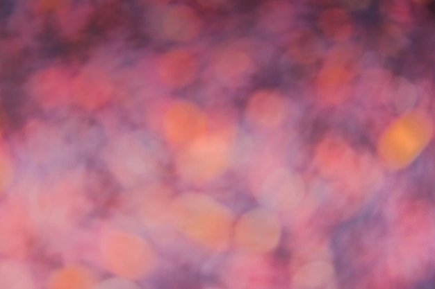 abstract  purple background / blur of purple and pink orange bokeh texture background