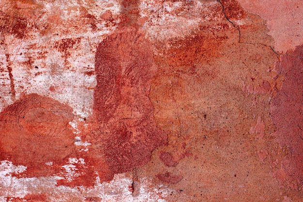 Abstract red background. Old wall texture. Stucco rough surface.