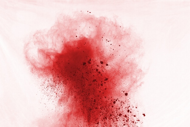 abstract red dust explosion on white background. 