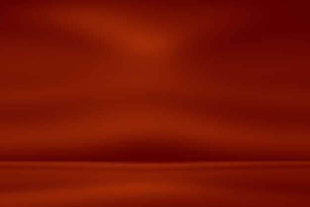 グラデーションの抽象的な赤い光スタジオの背景。