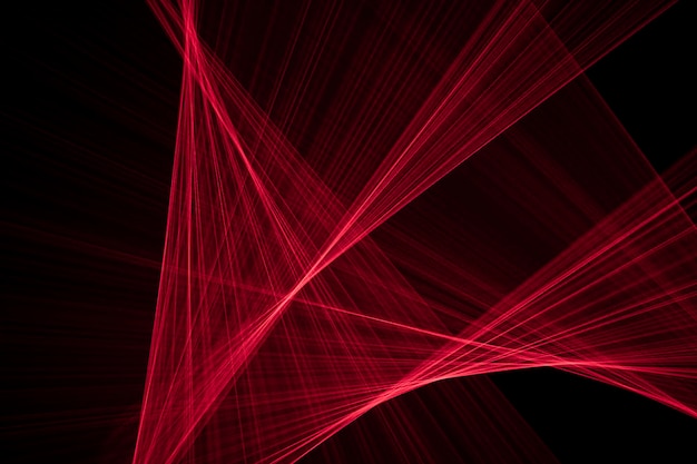 검정색 배경에 빛으로 그려진 추상 빨간색 선. 레이저 라인