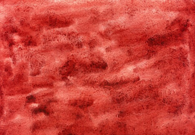 Abstract red watercolor background hand painted backdrop on textured paper