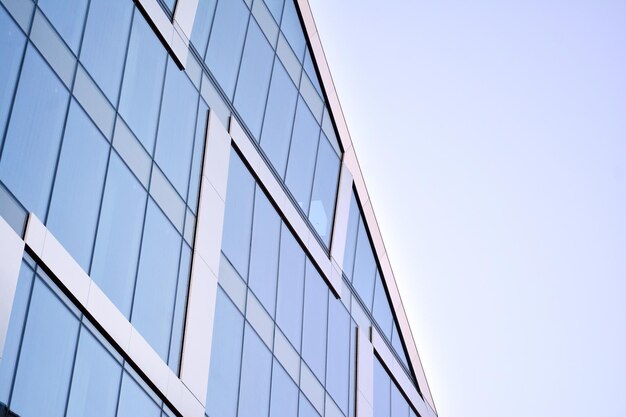 Abstract reflection of modern city glass facades modern office building detail