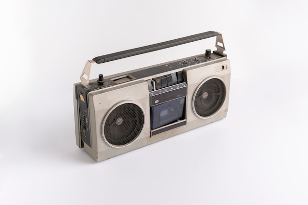 A abstract retro simple radio cassette recorder isolated on\
color background, simple music listen on the party