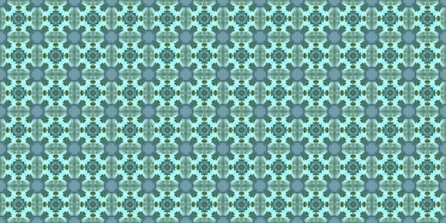 Abstract seamless pattern with a blue and green abstract motif like a kaleidoscope