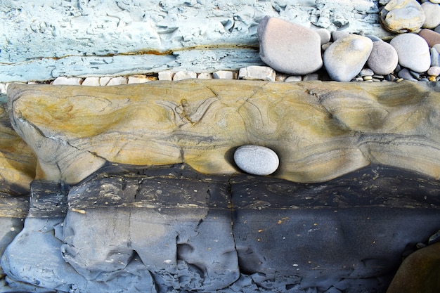 Foto fondo astratto della pietra della spiaggia