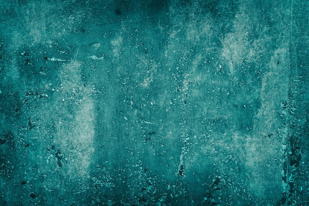 Abstract shabby teal background Old weathered painted dark turquoise surface