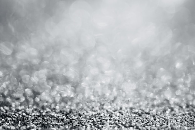 Abstract silver glitter sparkle texture with bokeh background