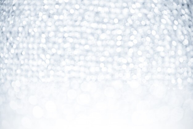 Photo abstract silver white lights glister bokeh background 