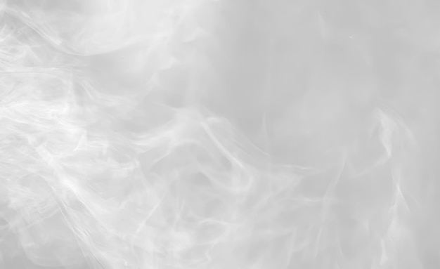 Abstract smoke background. Smoke illuminated beam of light. Image in light gray tones