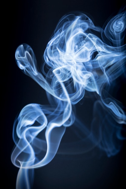 Abstract smoke on black background.