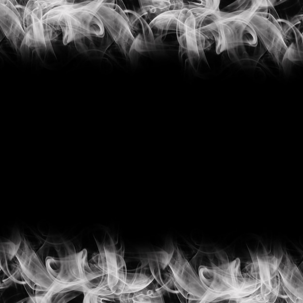 黒い背景に抽象的な煙フレーム