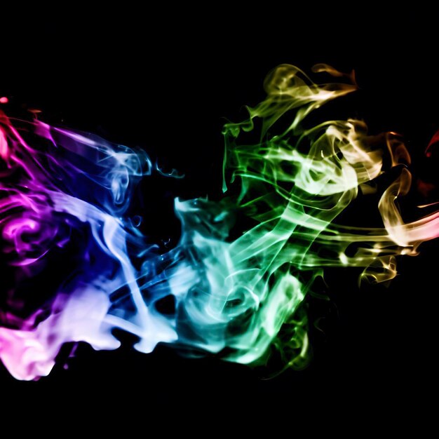 Photo abstract smoke isolated on black backgroundrainbow powder