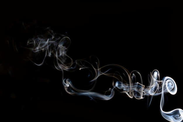 Abstract smoke line movement with white light effect on black background