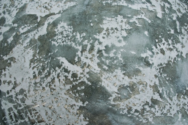 Фото Абстрактная гладкая штукатурка на бетонной стене выглядит грязной и потрескавшейся текстурой фона
