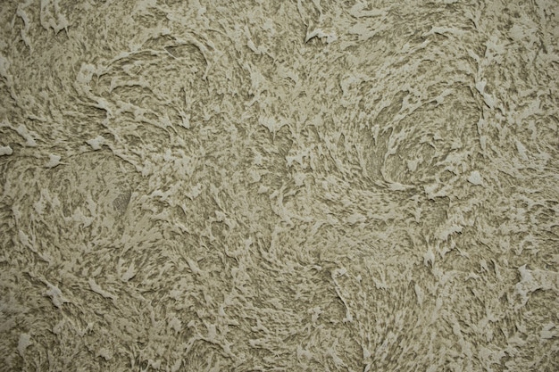 抽象的な滑らかなコンクリート壁石膏は汚れてひびの入った背景のザラザラした質感