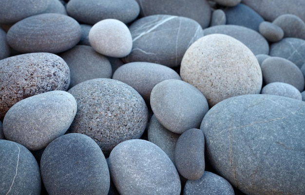 Abstract smooth round pebbles sea texture background