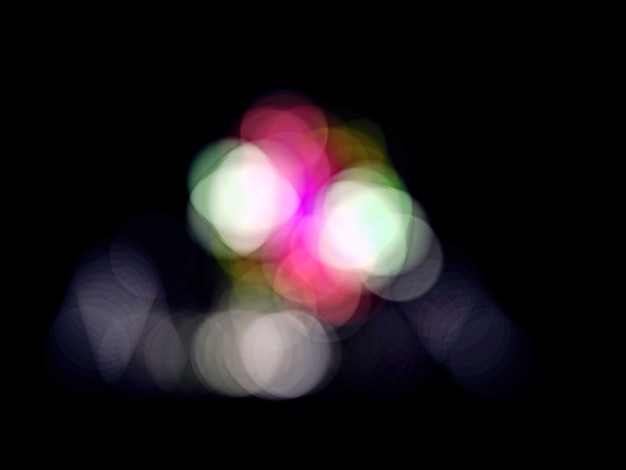 Bokeh morbido astratto su sfondo di colore scuro.