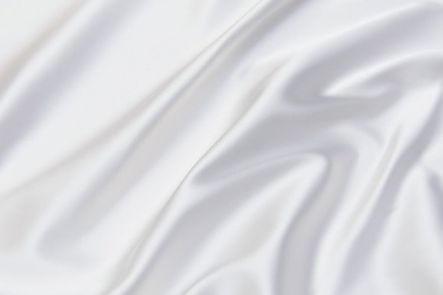 Photo abstract and soft focus wave of white fabric background, white texture and detail