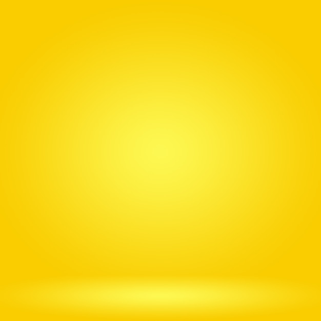 Photo abstract solid of shining yellow gradient studio
