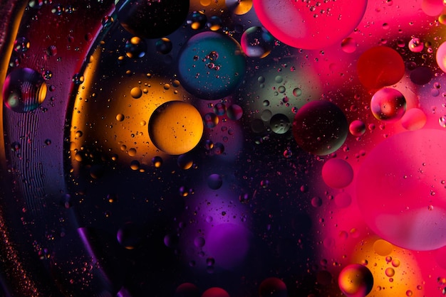 Abstract space background Water drops of different colours