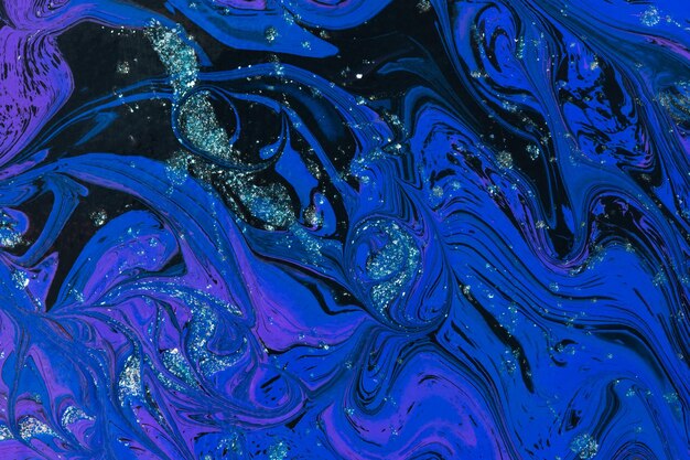 Abstract space blue purple black background. Acrylic painting fluid art.