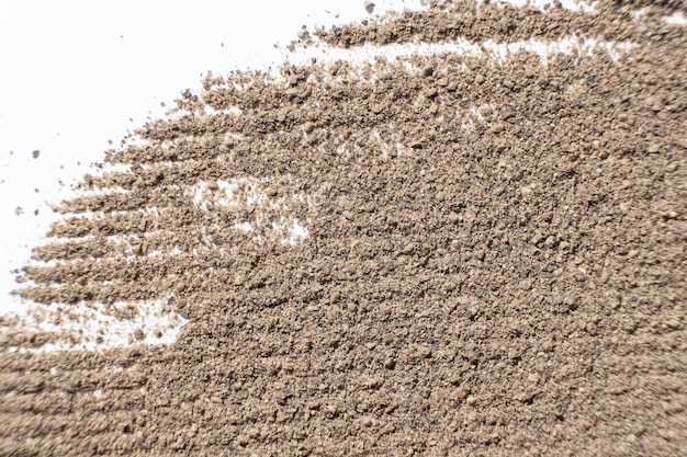 abstract striped brown ground black pepper background top view creativity in cooking