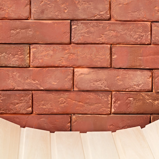 Abstract surface of an old red brick.