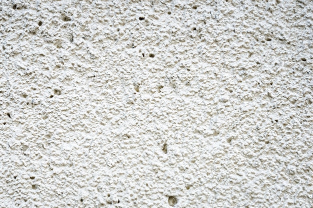 Foto superficie astratta e texture di parete in pietra di cemento bianco