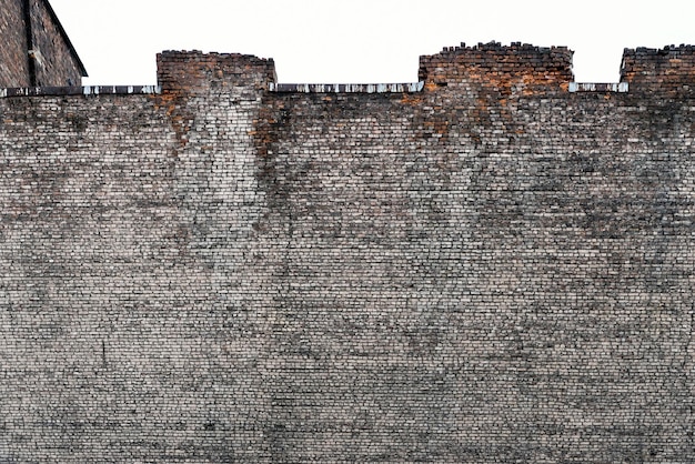 Foto struttura astratta di un grande vecchio muro di mattoni della fortezza