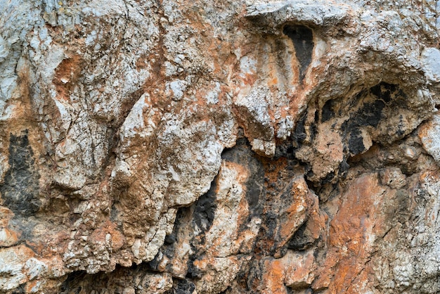 Abstract texture of a bumpy stone surface closeup