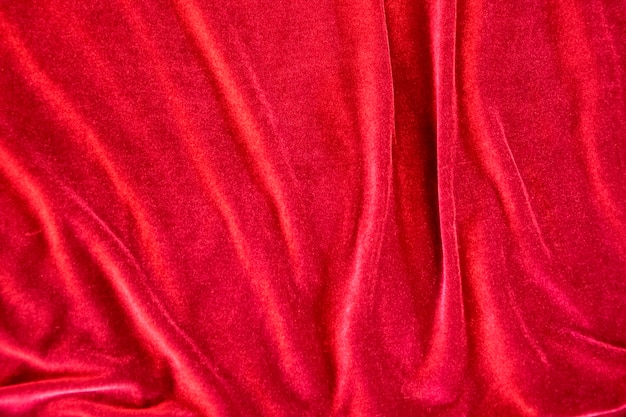 Abstract texture of draped red velvet background