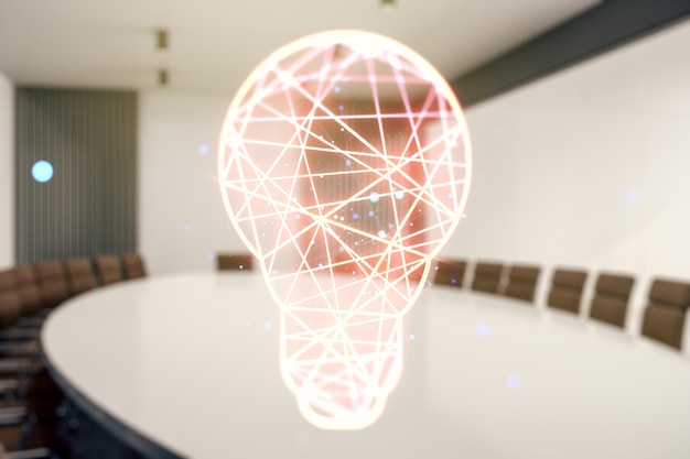 Abstract virtual light bulb hologram on a modern boardroom background idea concept Multiexposure