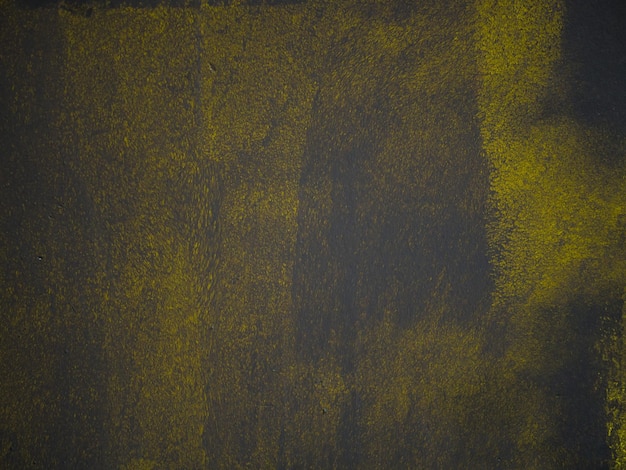 Abstract wall painting yellow and greyCements background abstract texture