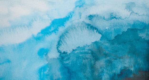 Abstract watercolor background of blue color on a white background