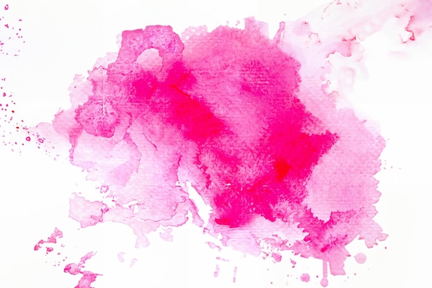 Photo abstract watercolor backgroundsplash color pink on paper