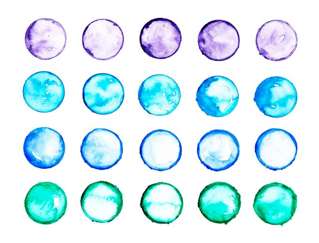 Photo abstract watercolor circles paint spots on a white background palette of green blue and violet round