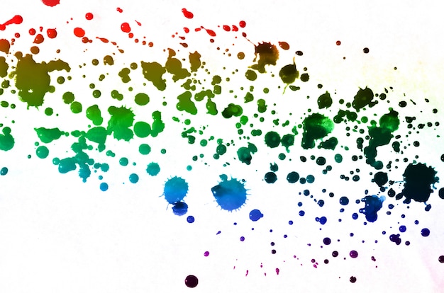 Foto la pittura astratta dell'acquerello cade la spruzzata delle macchie di inchiostro colorate multi di tutti i colori.